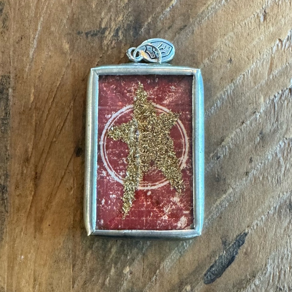 Jewel Kade Charm “shooting star” 
Annie Oakley inspired charm.